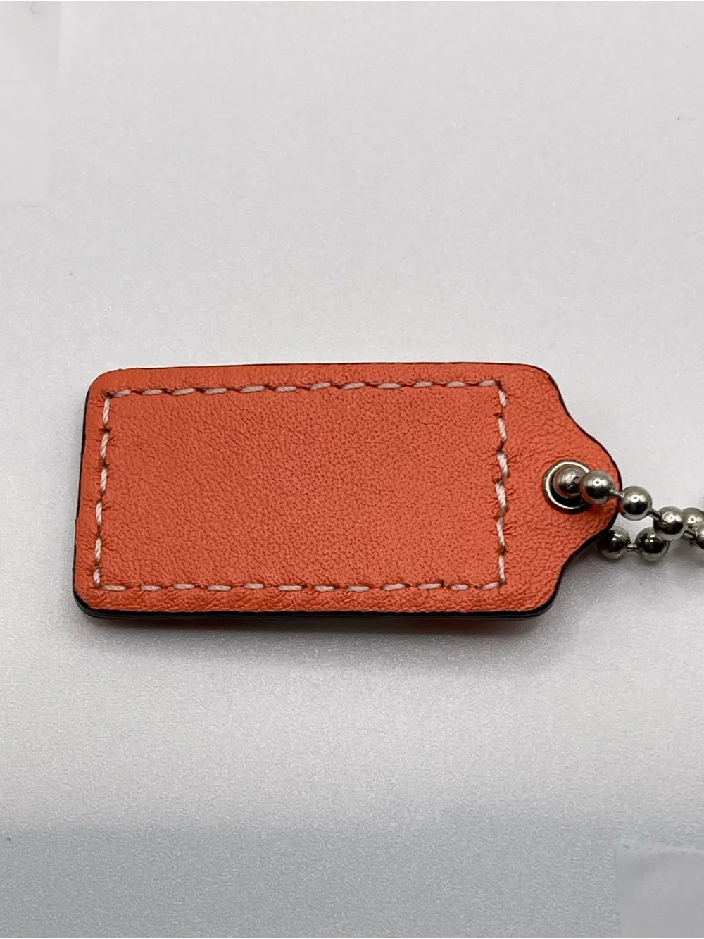Coach Tricolor Leather Hang Tag in Orange, Peach and White